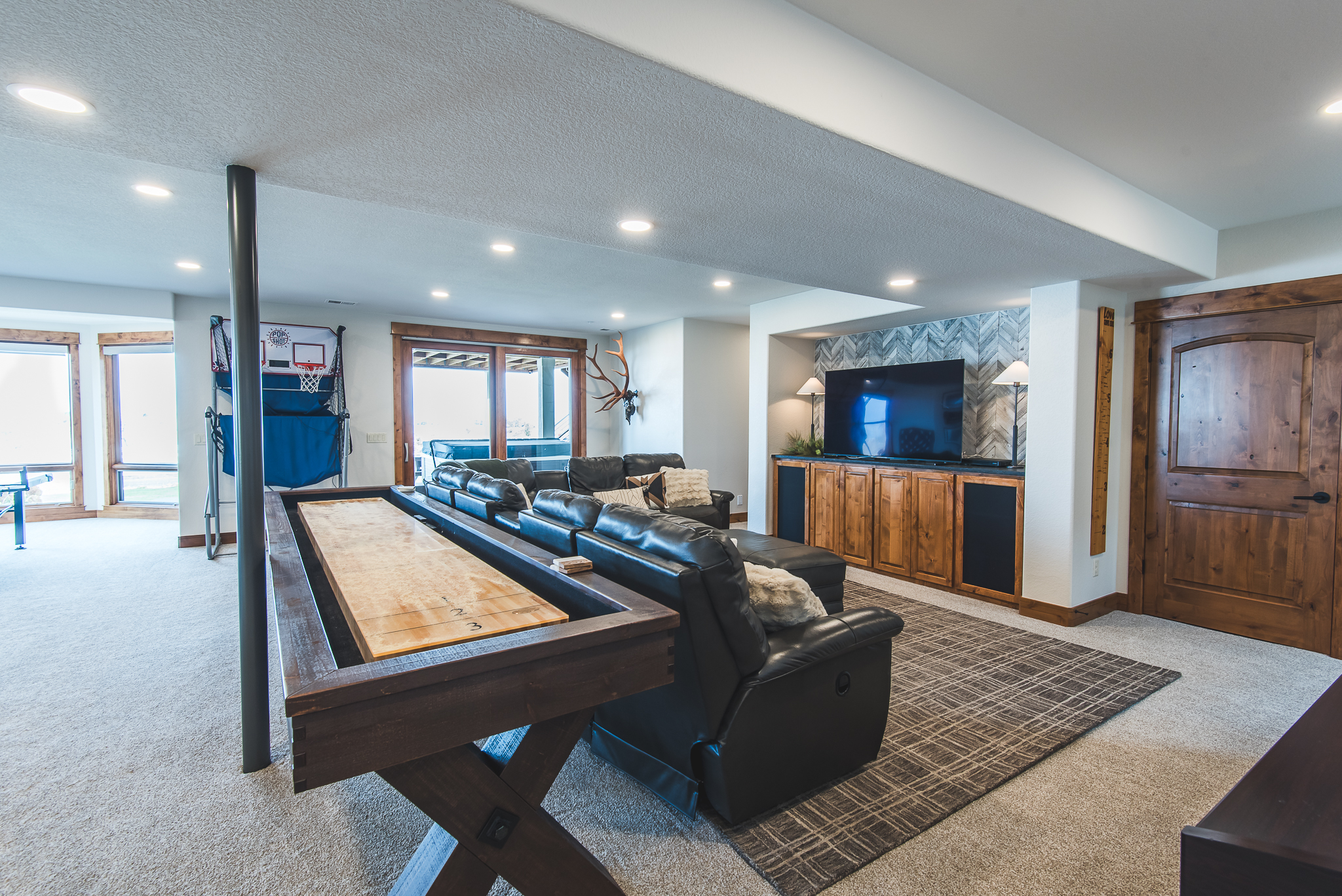 basement area with shuffleboard table