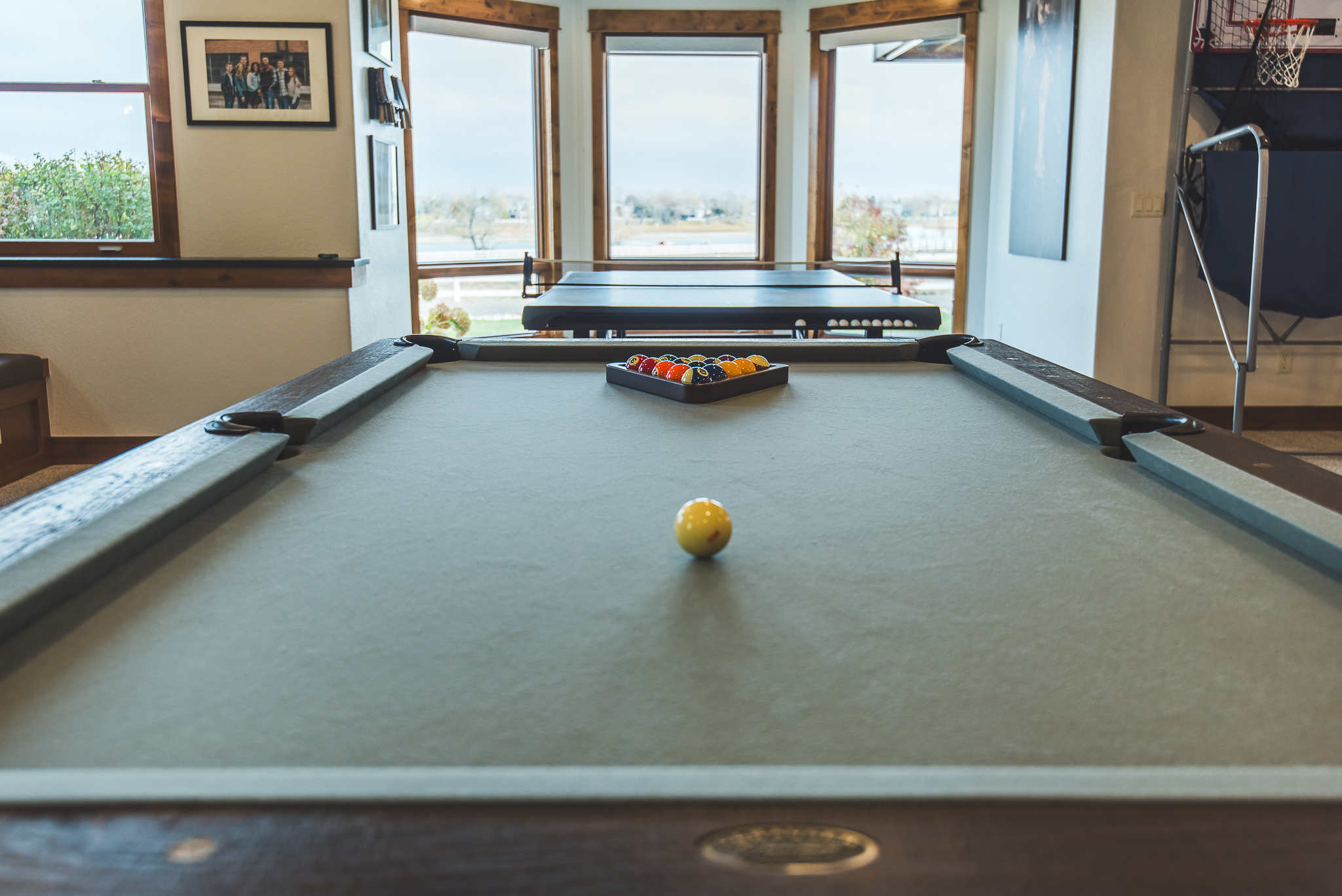 pool table with balls set in V formation